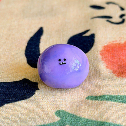 Bonino in a purple swirl color. Front facing.