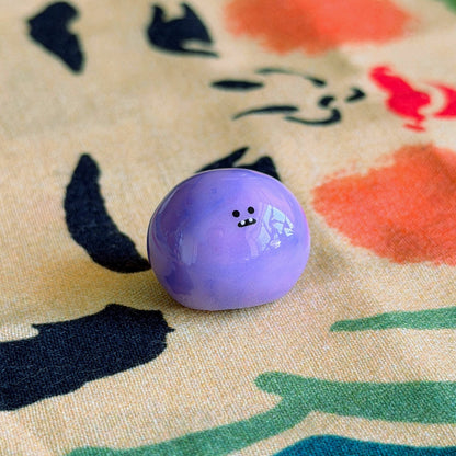 Bonino in a purple swirl color. Side facing.