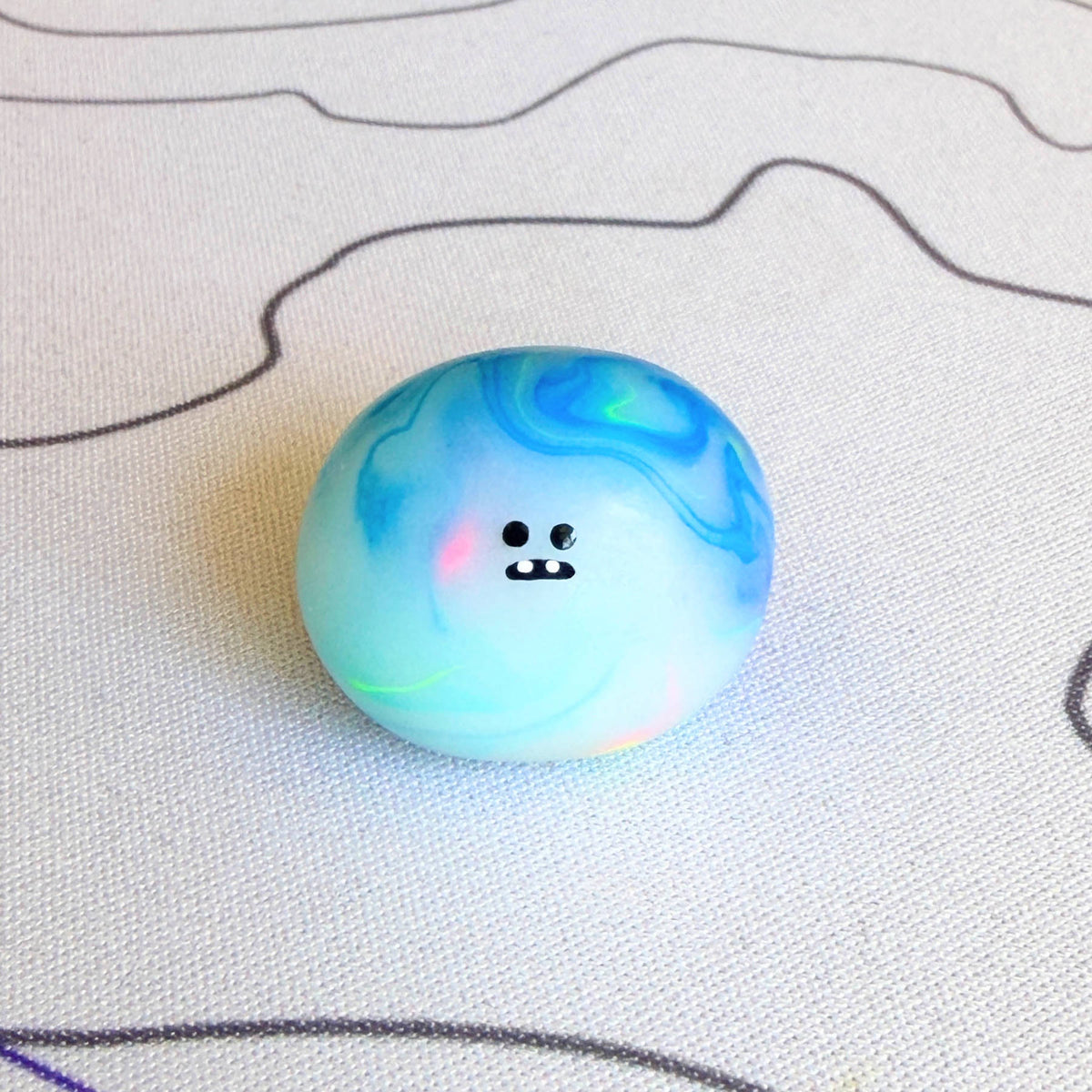 A handmade special edition Bonino - 90s water elemental swirl design - front facing.